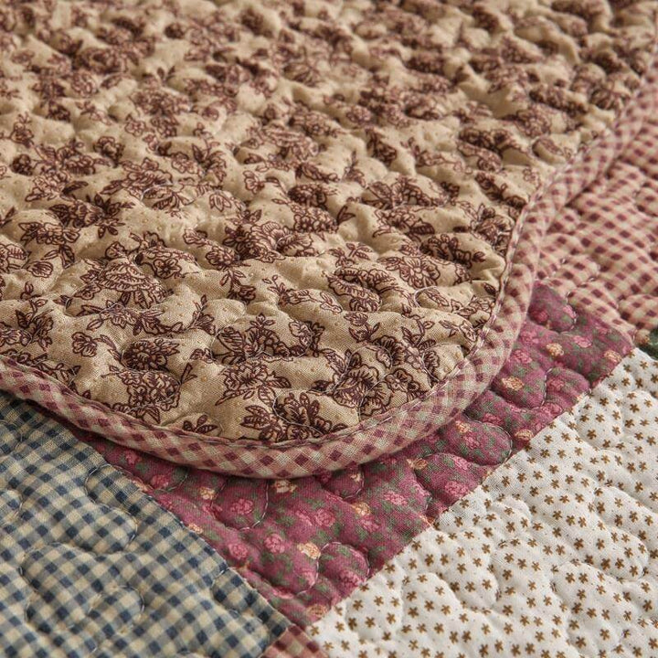 Full view of a sofa with a fitted quilted non-slip cotton blend cover, washable, pet-friendly.