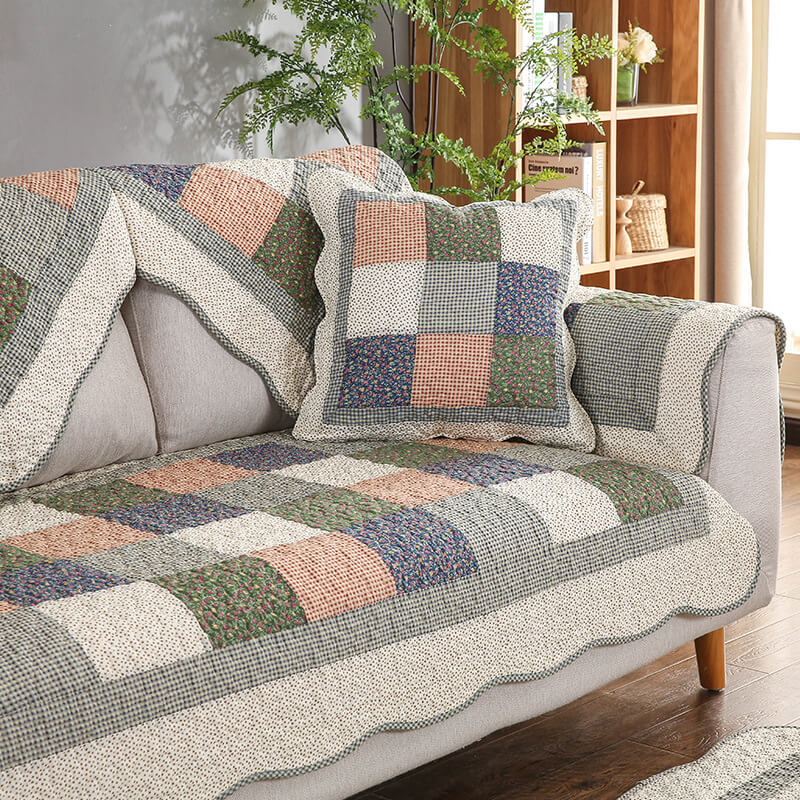 Practical quilted cotton blend sofa protector, non-slip design, washable for long-lasting use.