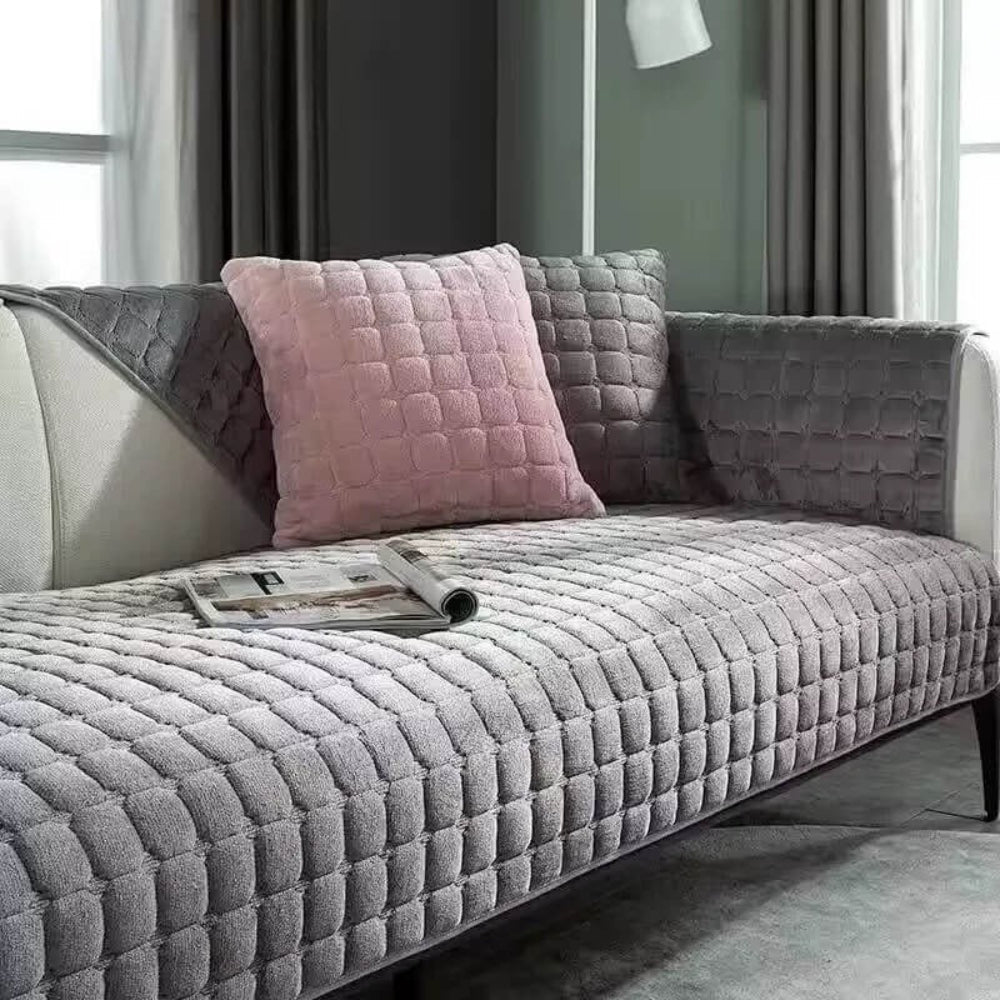Modern flannel sofa cover in a living room, anti-slip, scratch-resistant, pet-friendly comfort.