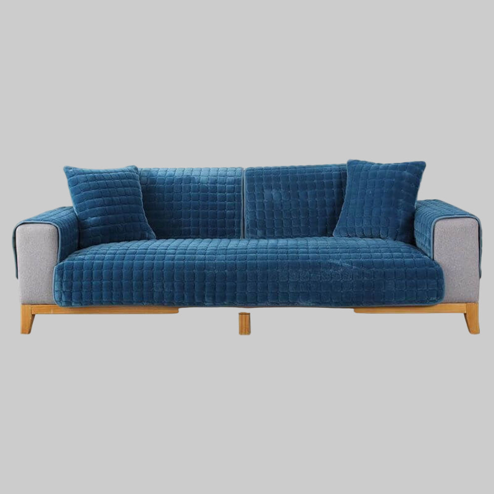 Flannel sofa cover protecting a couch from pet scratches, anti-slip, quilted, stylish home decor.