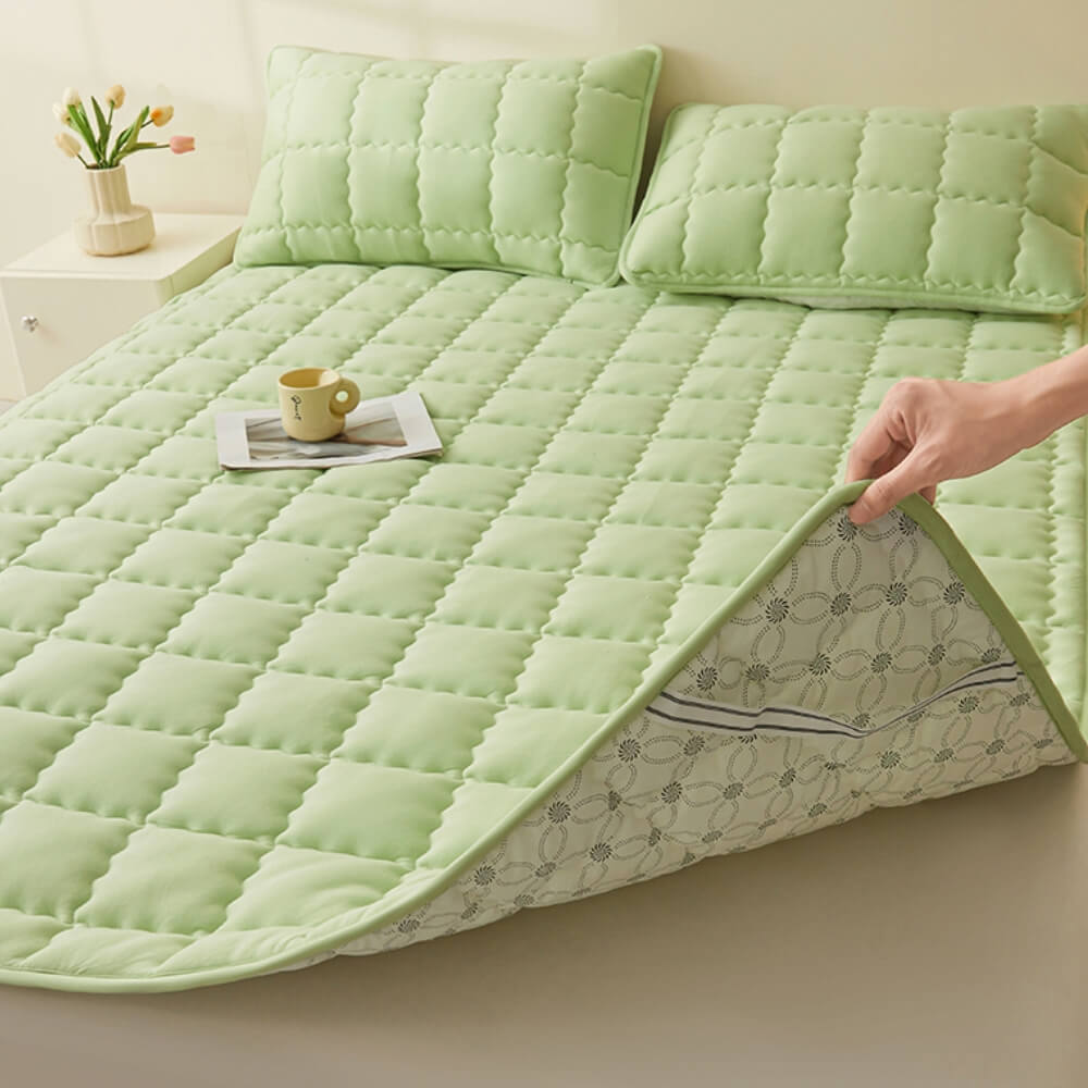 Breathable quilted mattress topper with non-slip backing, improving sleep quality