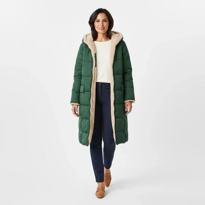 Long women's hooded puffer coat, designed for maximum warmth in winter.