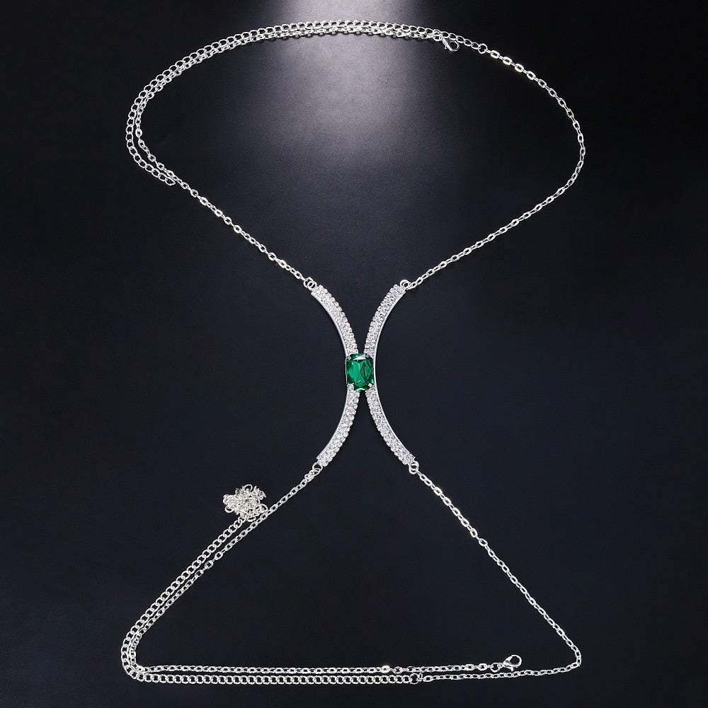 Close-up of a women's radiant crystal rhinestone chest chain body jewelry, highlighting intricate details.