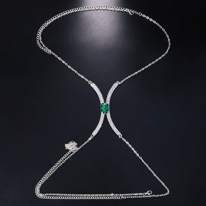 Close-up of a women's radiant crystal rhinestone chest chain body jewelry, highlighting intricate details.