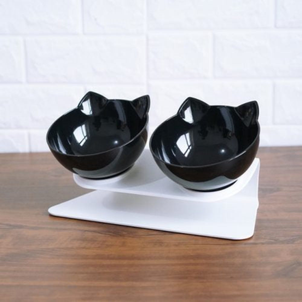 White raised cat feeder with two bowls, promoting healthy digestion and neck comfort for pets.