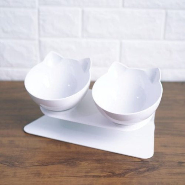 Elevated pet feeder with double ceramic bowls, designed for easy cleaning and anti-vomiting benefits.