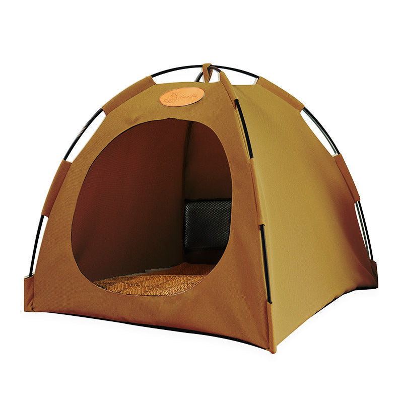 Cat lounging comfortably in a natural rattan pet tent with a cooling mat.