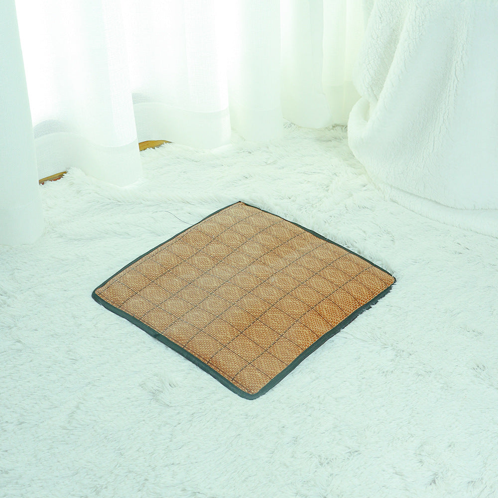 Compact rattan cat bed with a washable cooling mat, simple setup for pet owners.