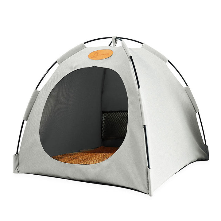 Stylish cat accessory: a rattan tent bed with a removable cooling mat for pet comfort.