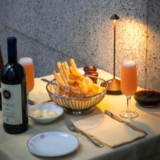 Cordless LED lamp, rechargeable, provides soft ambient light for home or patio.