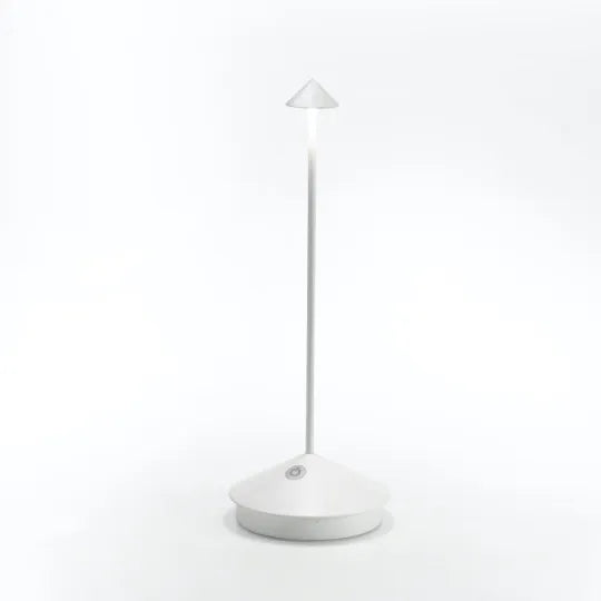 Modern rechargeable LED lamp, cordless, for convenient portable ambient lighting.
