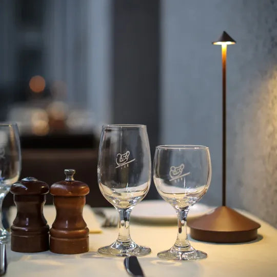 Modern LED table lamp, rechargeable & cordless, perfect for indoor/outdoor accent light.
