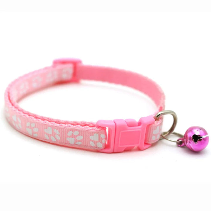 Purple stylish dog collar with an adjustable bowtie and bell, vivid pet accessory for small animals.