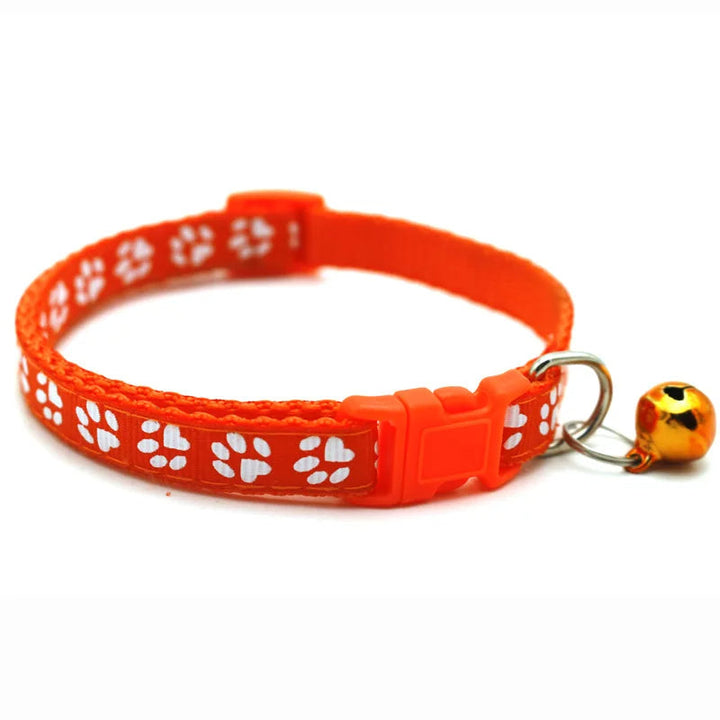Close-up of a quick release adjustable pet bowtie collar with bell, showcasing vibrant color & comfort.