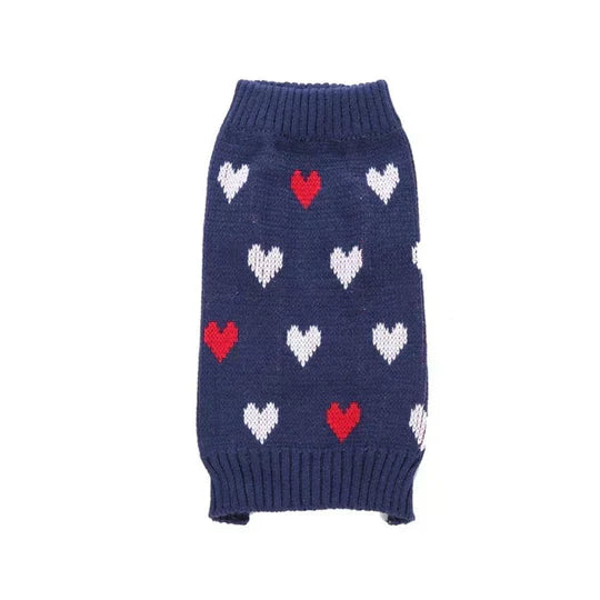 Pet accessories: cozy red dog sweater with prominent white snowflake pattern