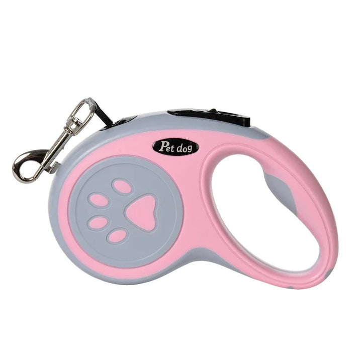 Red expandable nylon dog leash with quick release for small to medium pets, ideal for walking.