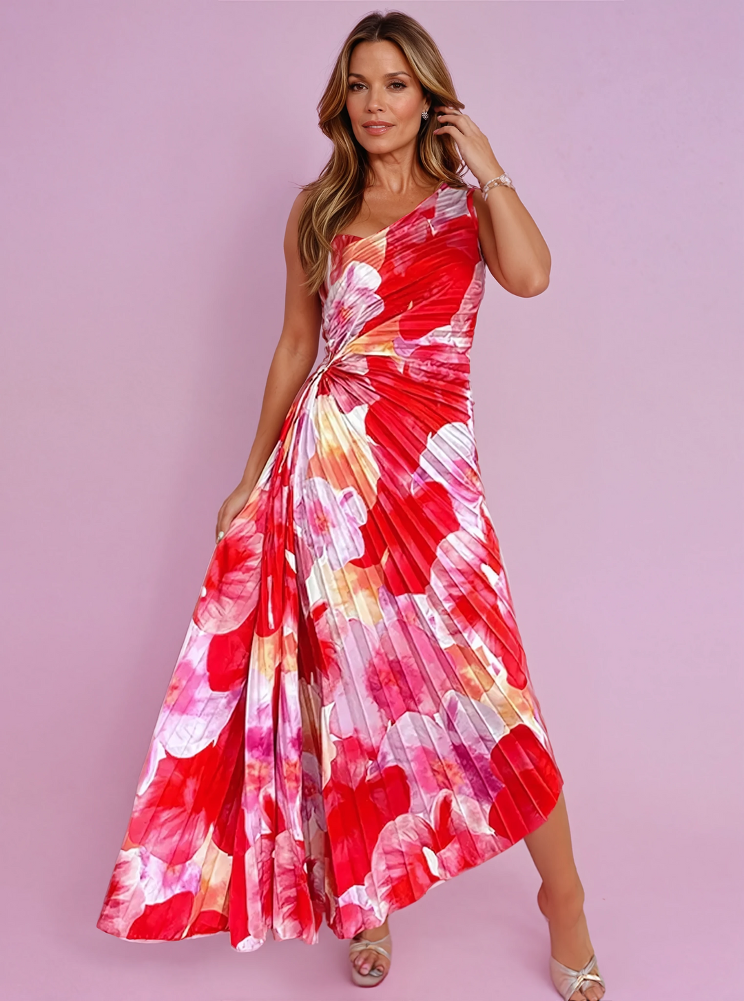 Red floral pleated maxi dress for women, perfect as a wedding guest or special occasion dress.