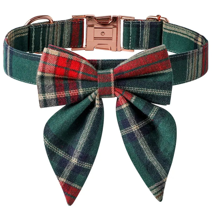 Detailed view of a durable, adjustable dog collar with red/green check and festive bow tie.