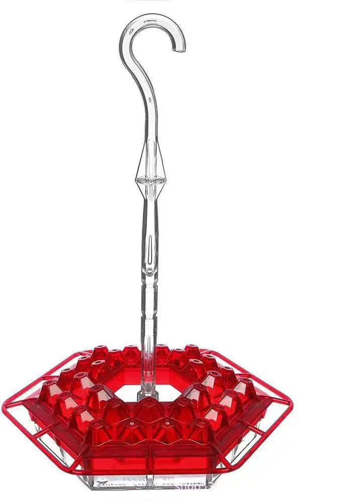 Hanging nectar feeder for hummingbirds, featuring an effective ant moat for outdoor use