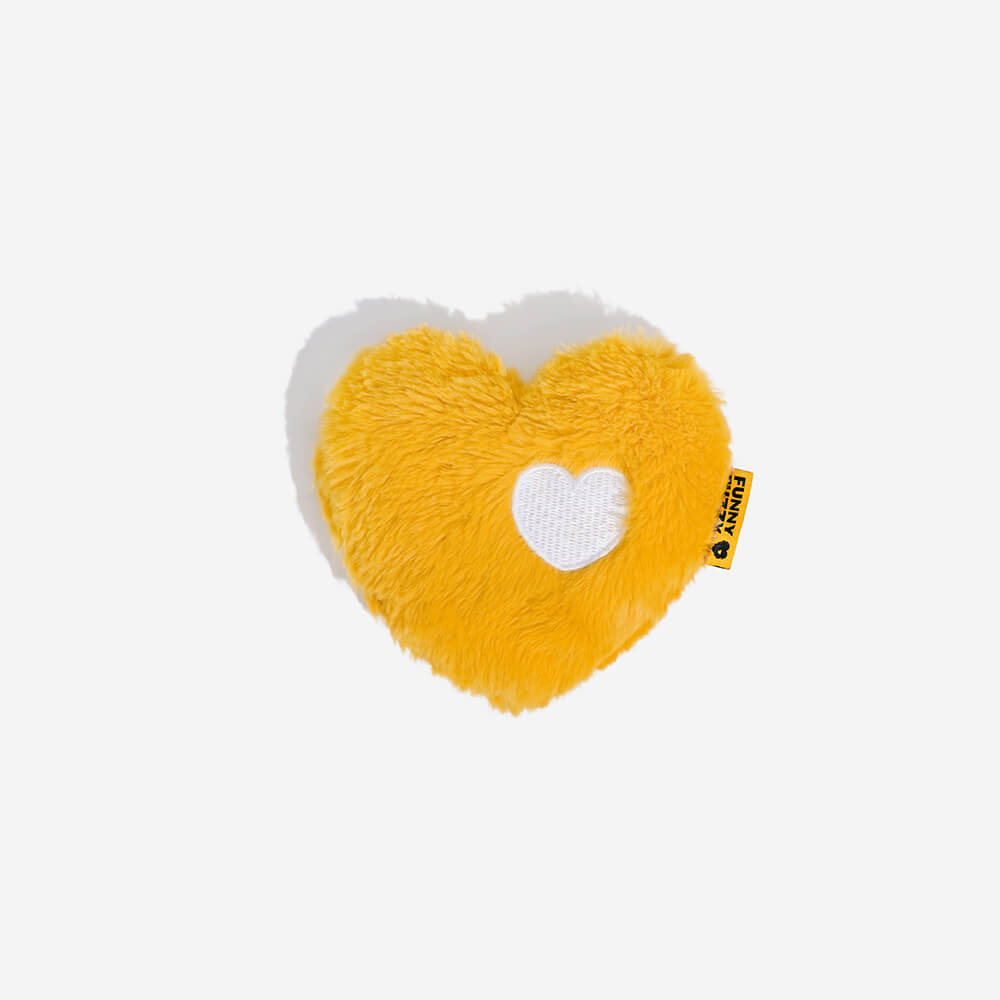 Soft red plush heart dog toy, a squeaky accessory for stress relief and enjoyable playtime activities.