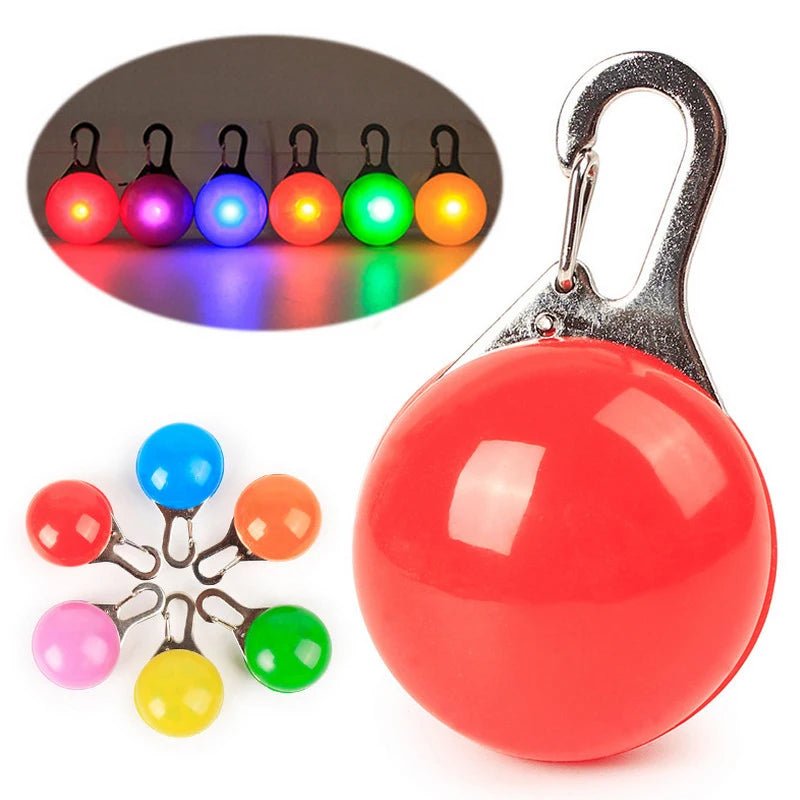 Compact pet safety light with flashing LED, ideal for dog and cat collars during night walks.