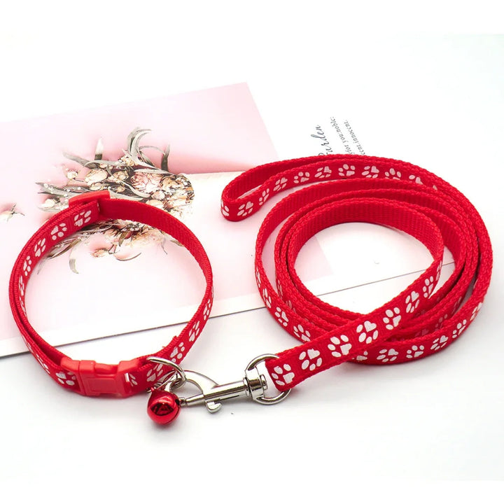 Red nylon soft-grip dog leash for small to medium pets, durable and comfortable for walks.