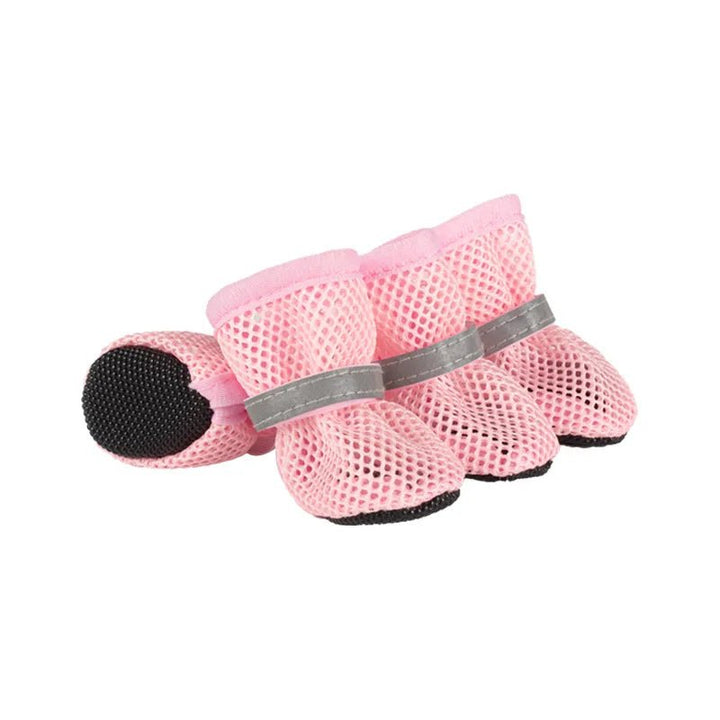 Breathable mesh and adjustable straps on a gray dog shoe, highlighting comfort for pet footwear and outdoor gear.