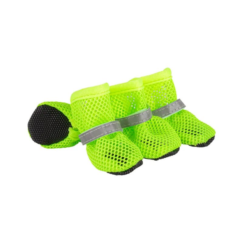 Collection of colorful paw protection dog shoes for small & medium breeds, arranged neatly for pet footwear display.