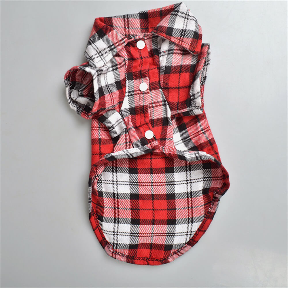 Blue plaid dog shirt with buttons, a classic pet apparel choice for fashionable canines