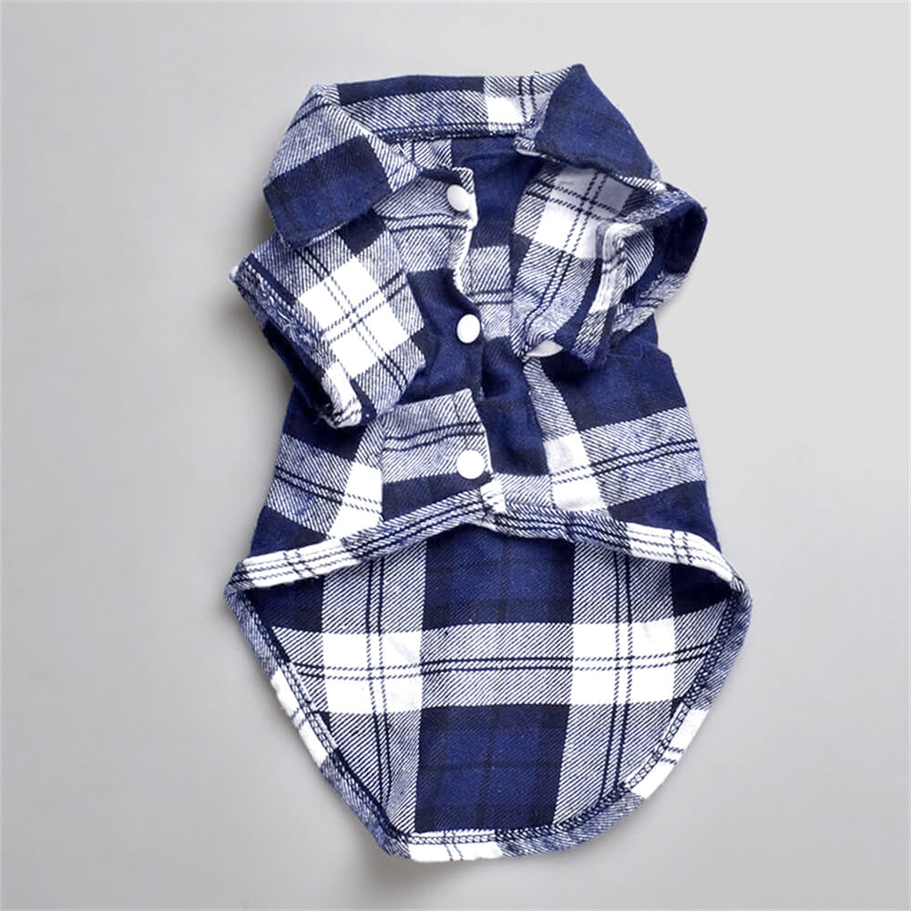 Close-up of a green plaid button-up dog shirt, showing soft cotton fabric and detail