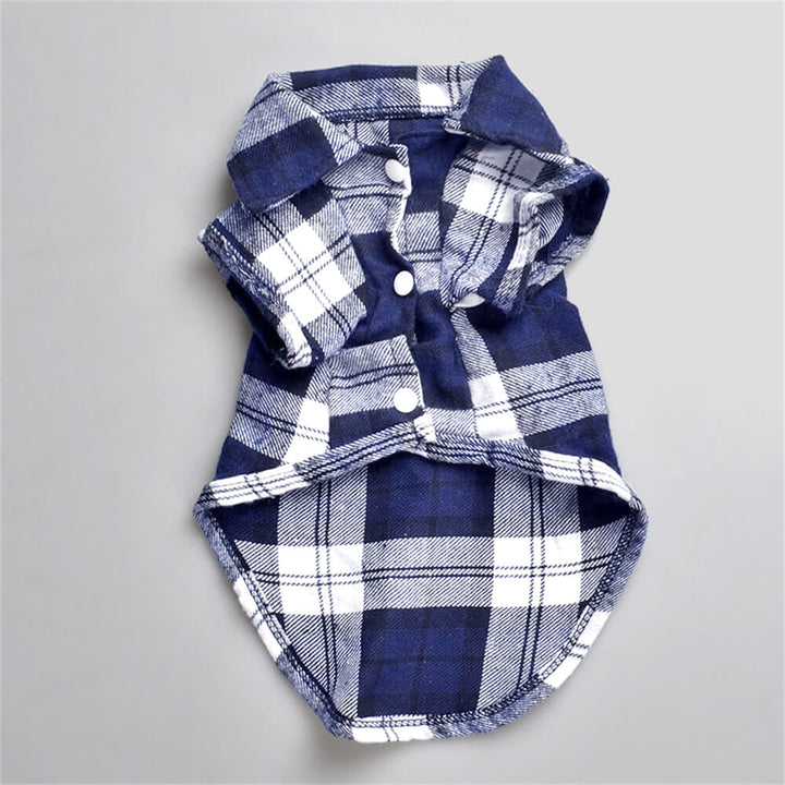 Close-up of a green plaid button-up dog shirt, showing soft cotton fabric and detail
