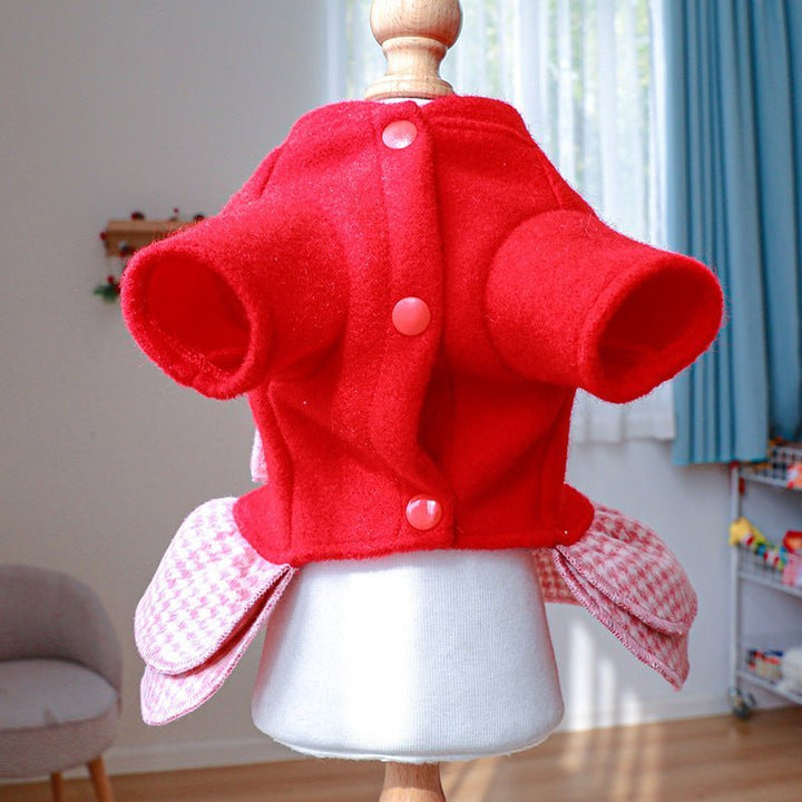 Red plaid dog harness dress for small breeds, featuring a charming bow detail for pets.