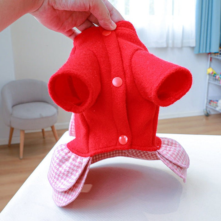 Cozy red plaid dog outfit harness, designed for comfort and style in small dog apparel.