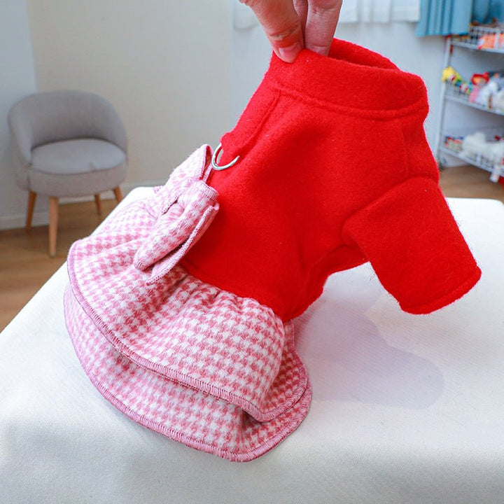Red plaid dog dress harness with bow, a stylish and functional pet clothing item for small dogs.