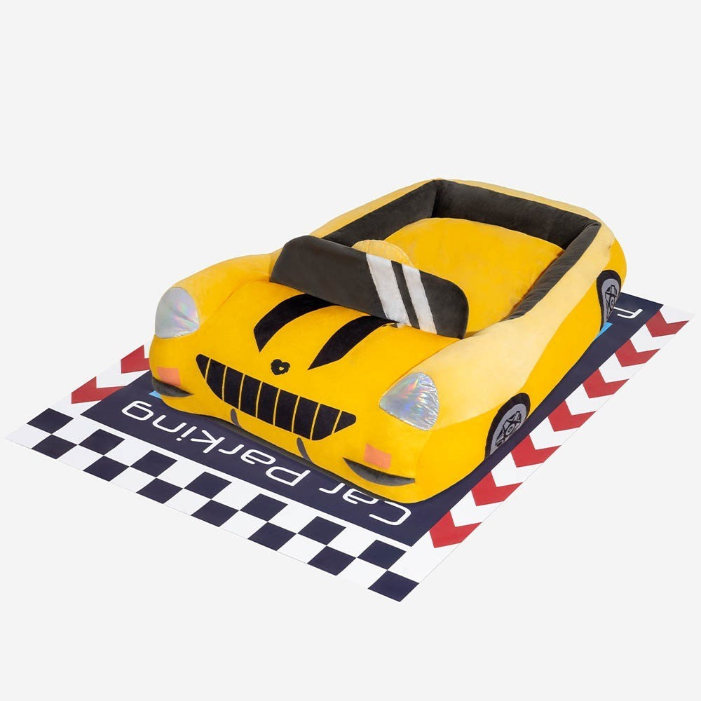 Small pet dog bed shaped like a race car, providing comfort and fun for your furry friend.