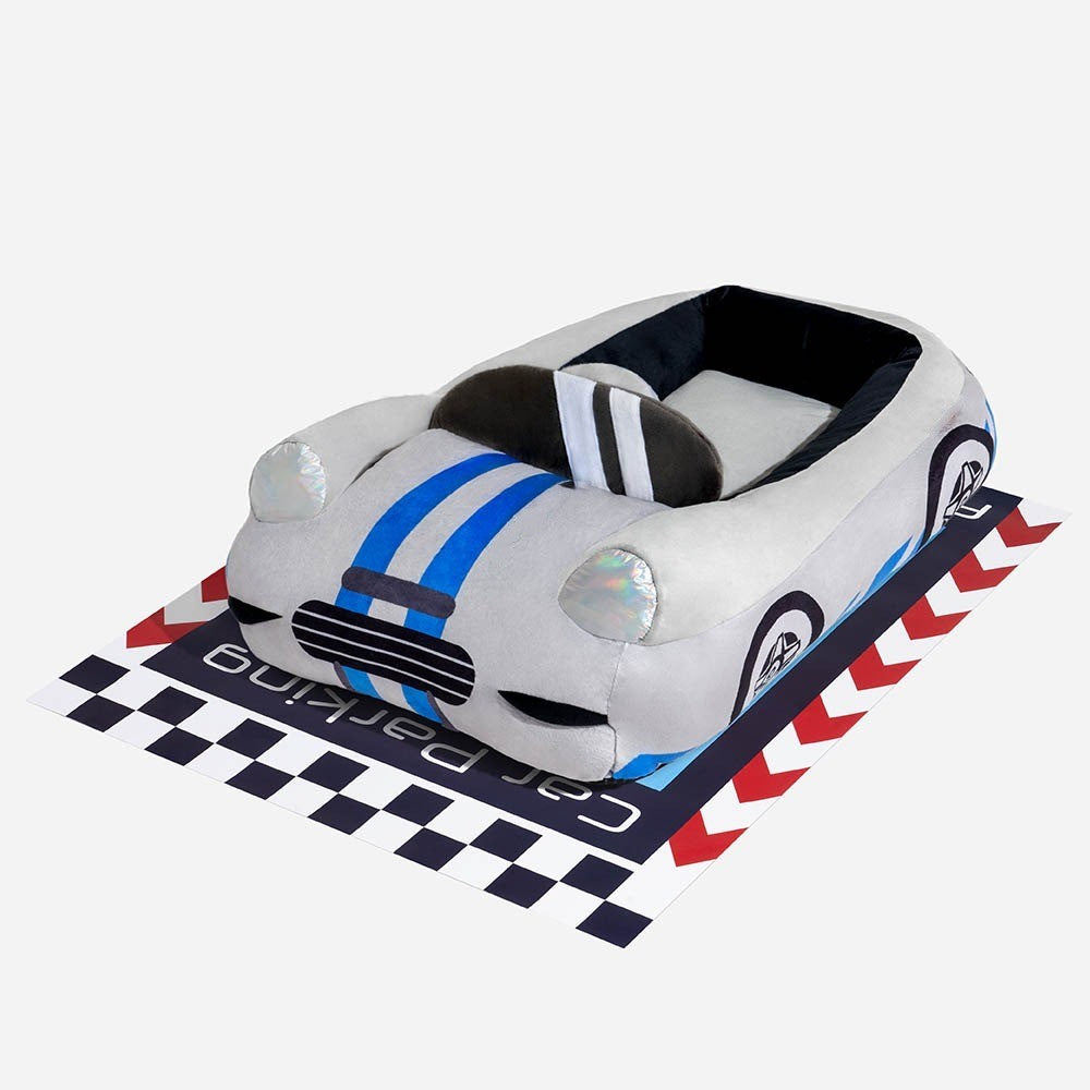 Stylish red race car dog bed, a cozy and interactive pet furniture piece for small dogs.