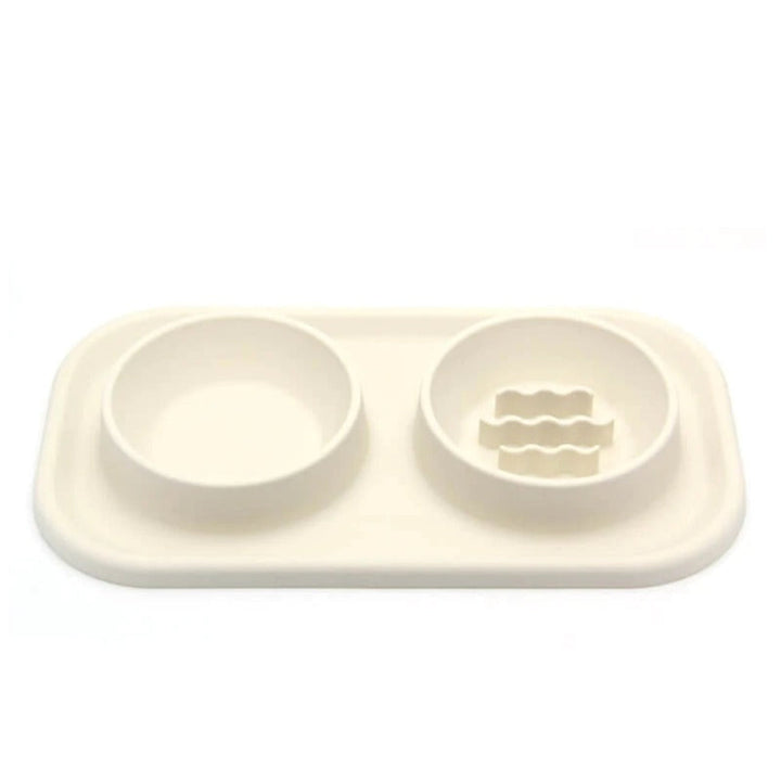 Red silicone pet slow feeder dual bowl for dogs and cats, promoting healthy eating habits