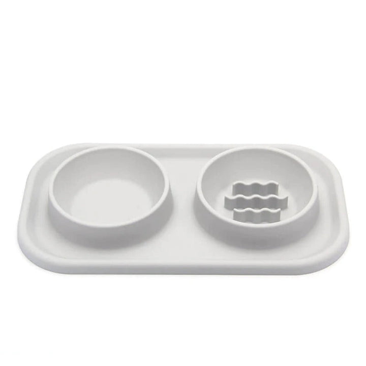 Green silicone slow feeder bowl for pets, two-in-one design for dog food and water