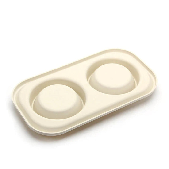 Pink pet slow feeder dual bowl, a non-slip silicone mat for dog and cat healthy eating