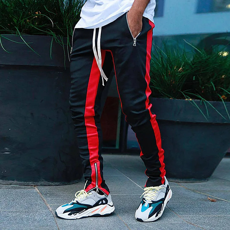 Performance men's FlexStride stretch joggers. Ultimate comfort athletic wear with practical zipper pockets.