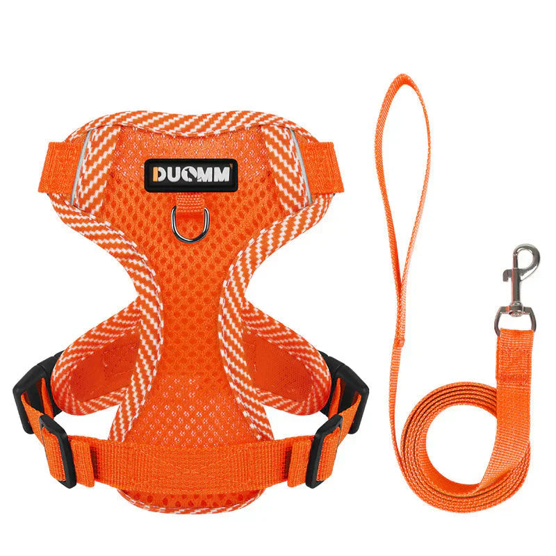 Black reflective dog harness with an attached matching pet leash, ideal for walks