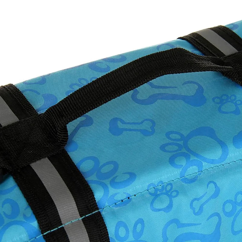 Reflective dog life jacket detail, highlighting the bright color and secure fastening for visibility.