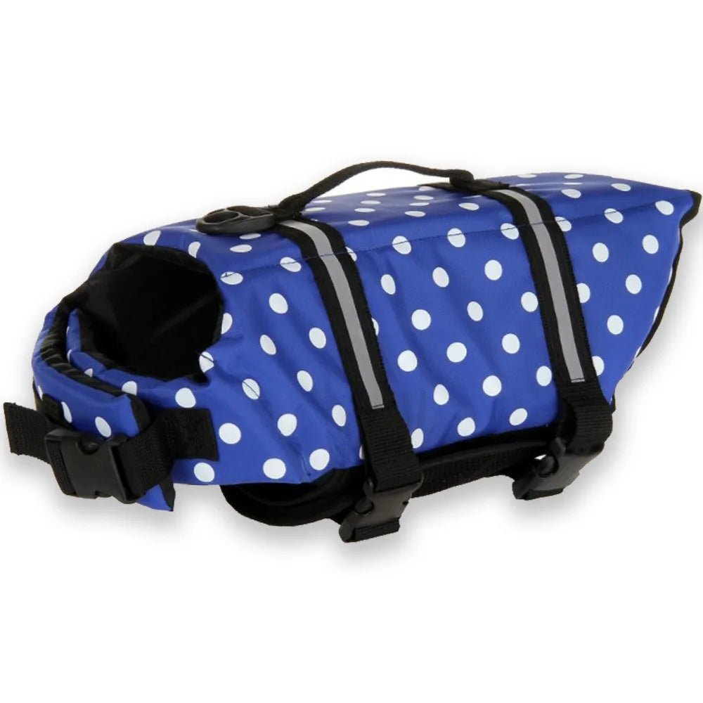 Group of dogs wearing various colored reflective life vests, showcasing pet safety range.