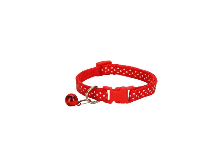 Close-up of reflective polka dot pet collar, showcasing adjustable buckle and durable material