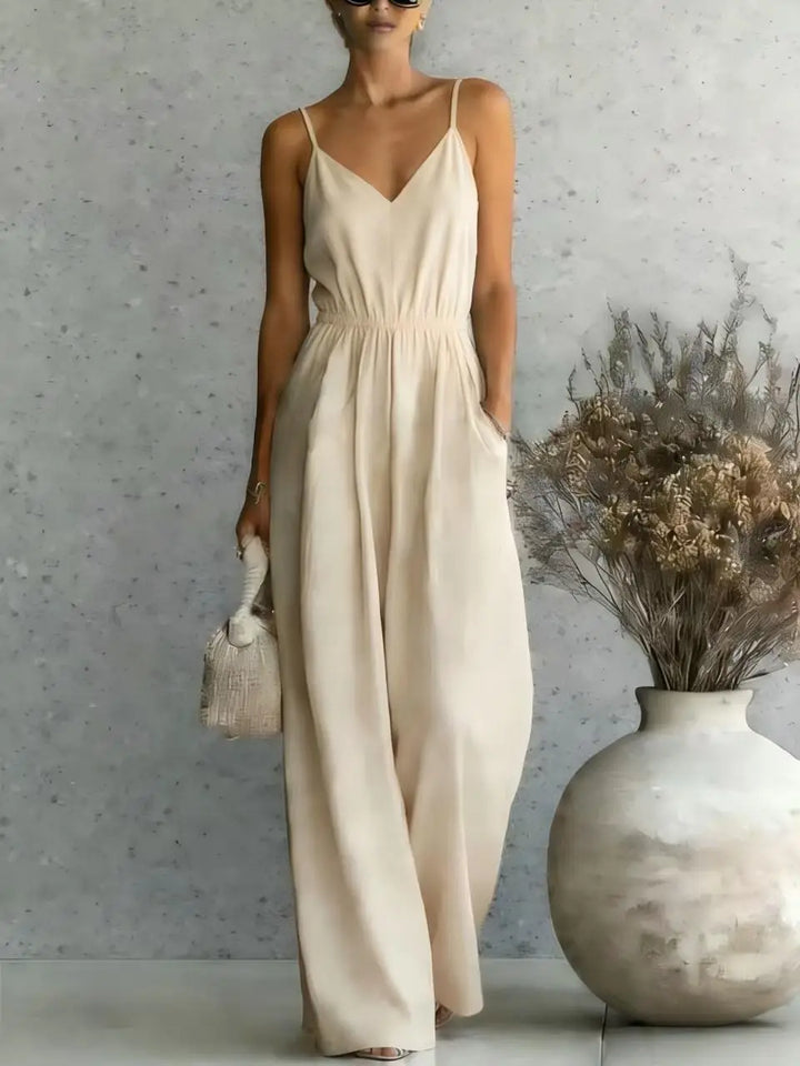 Effortless V-neck wide leg jumpsuit for women. A comfortable, sleeveless, relaxed fit perfect for vacations.