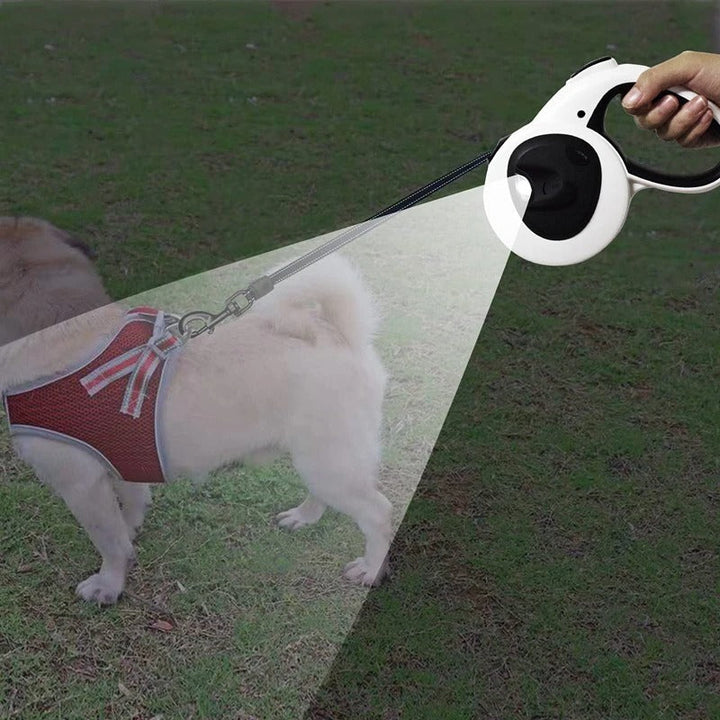 Retractable dog leash with LED light for night walks, includes poop bag dispenser, black with red accents