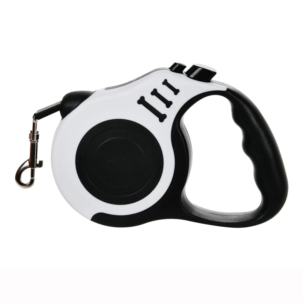 Dog owner holding a retractable pet leash, showcasing its ergonomic handle and design
