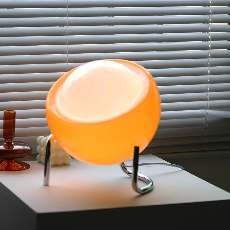 Minimalist retro glass orb ambient lamp. Nordic style LED table light, a sleek accent for modern home decor.