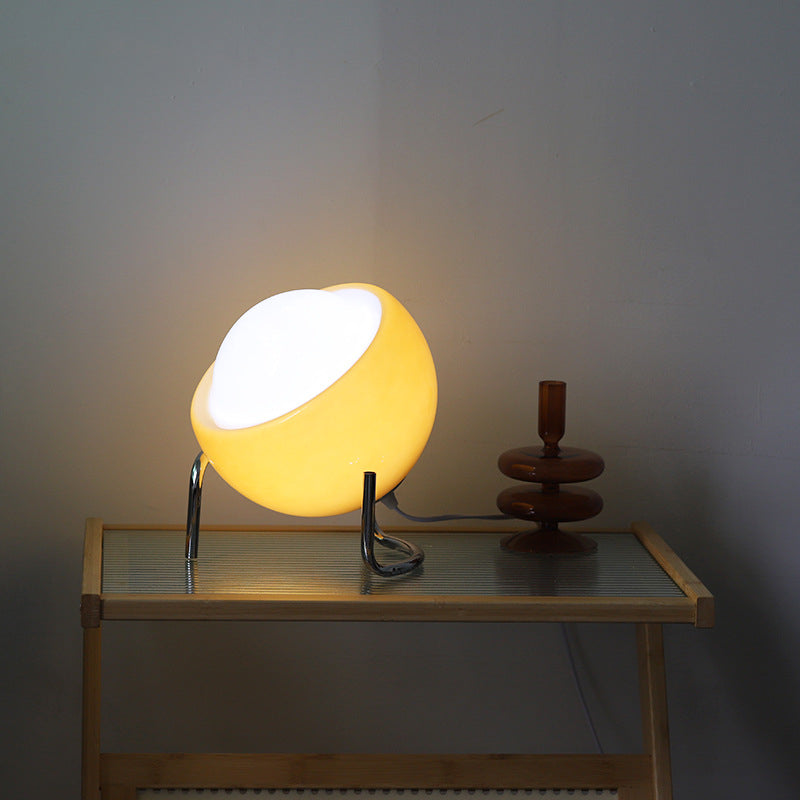 Ambient LED table lamp with a retro glass orb design. Nordic accent light for living room, bedroom or home decor.