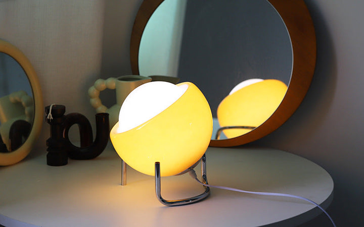Glass orb ambient lamp with a retro Nordic design. Elegant LED table light, perfect accent for modern home decor.